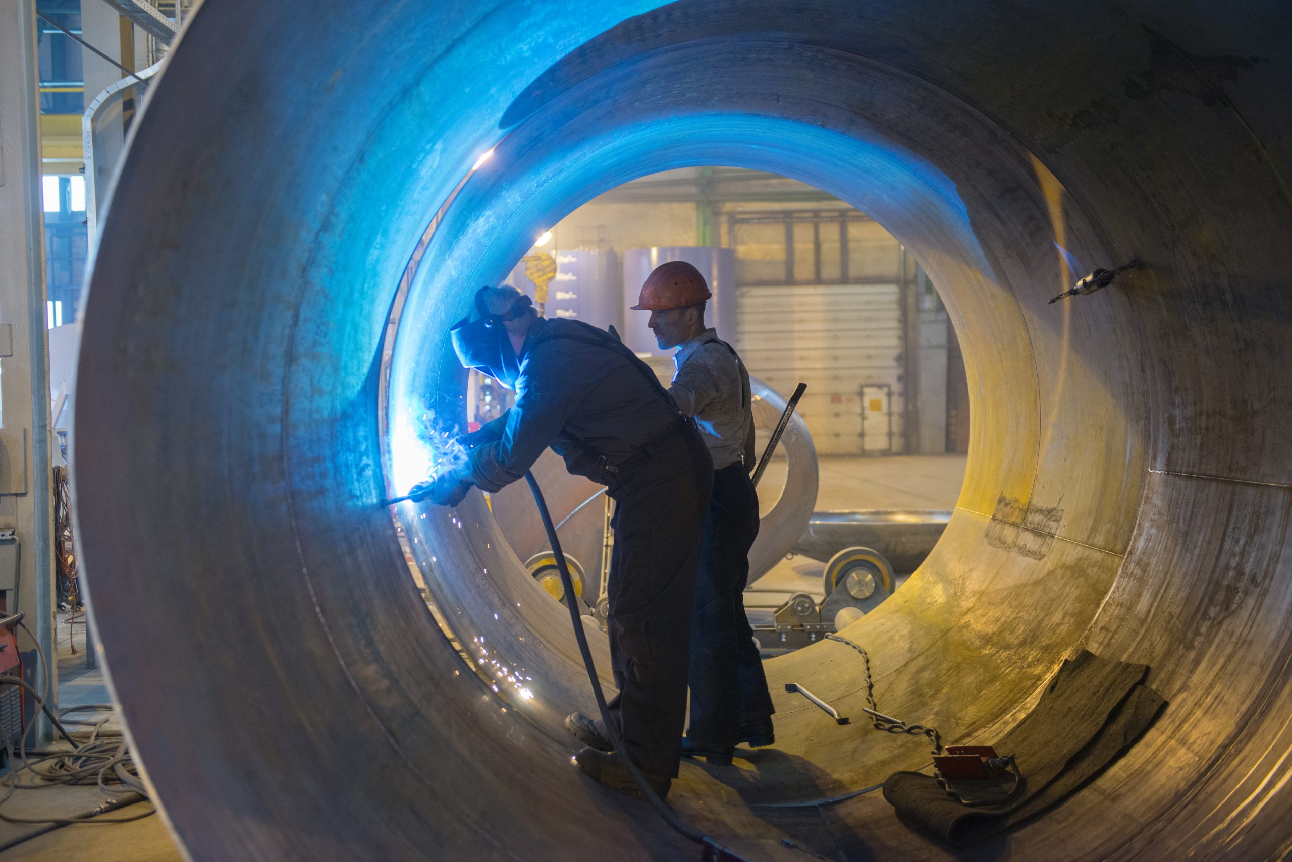 Welders at Facility. Photo link to RAPIDGate technology. 